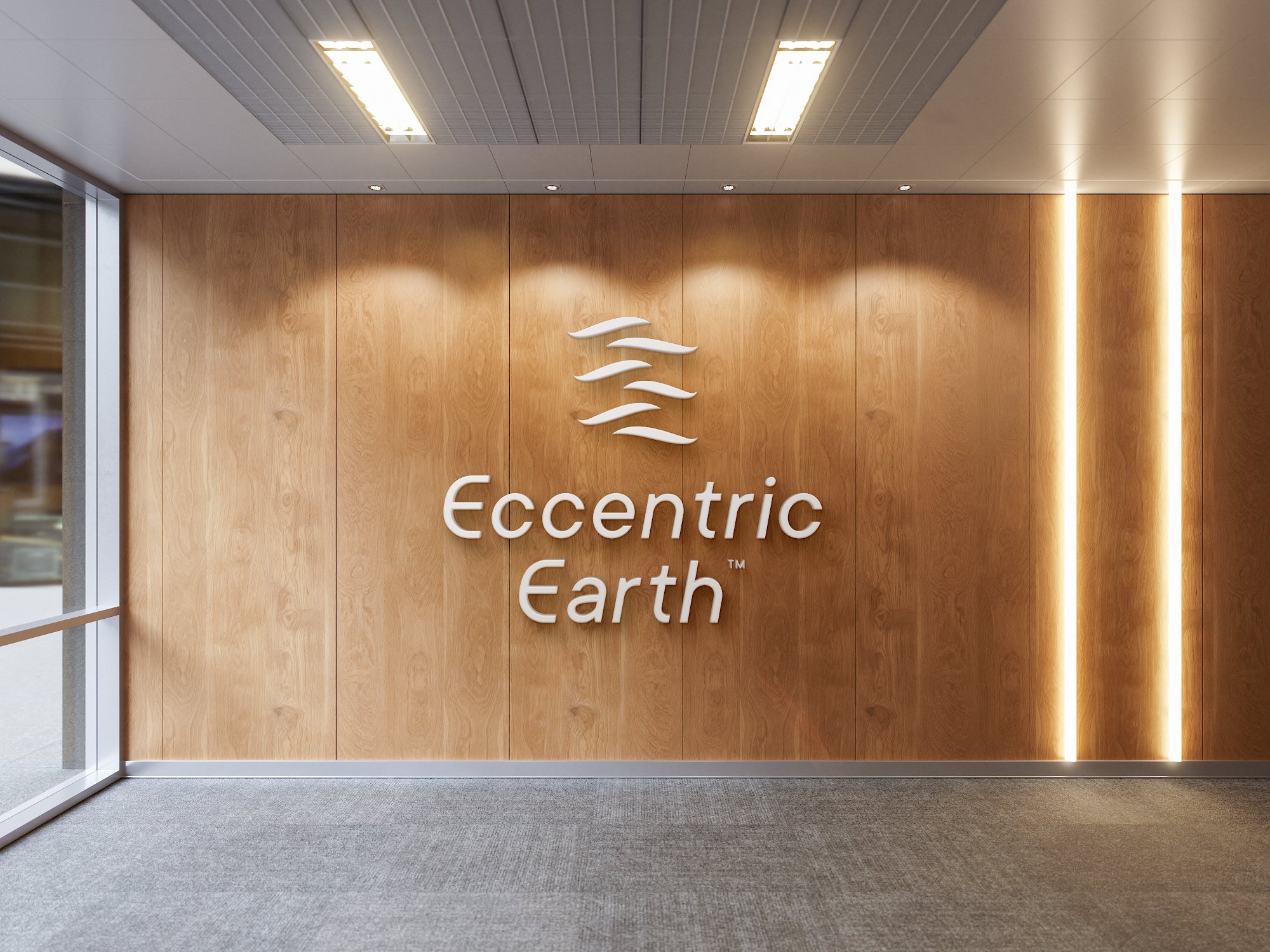 Eccentric Earth logo on a warm timber wall