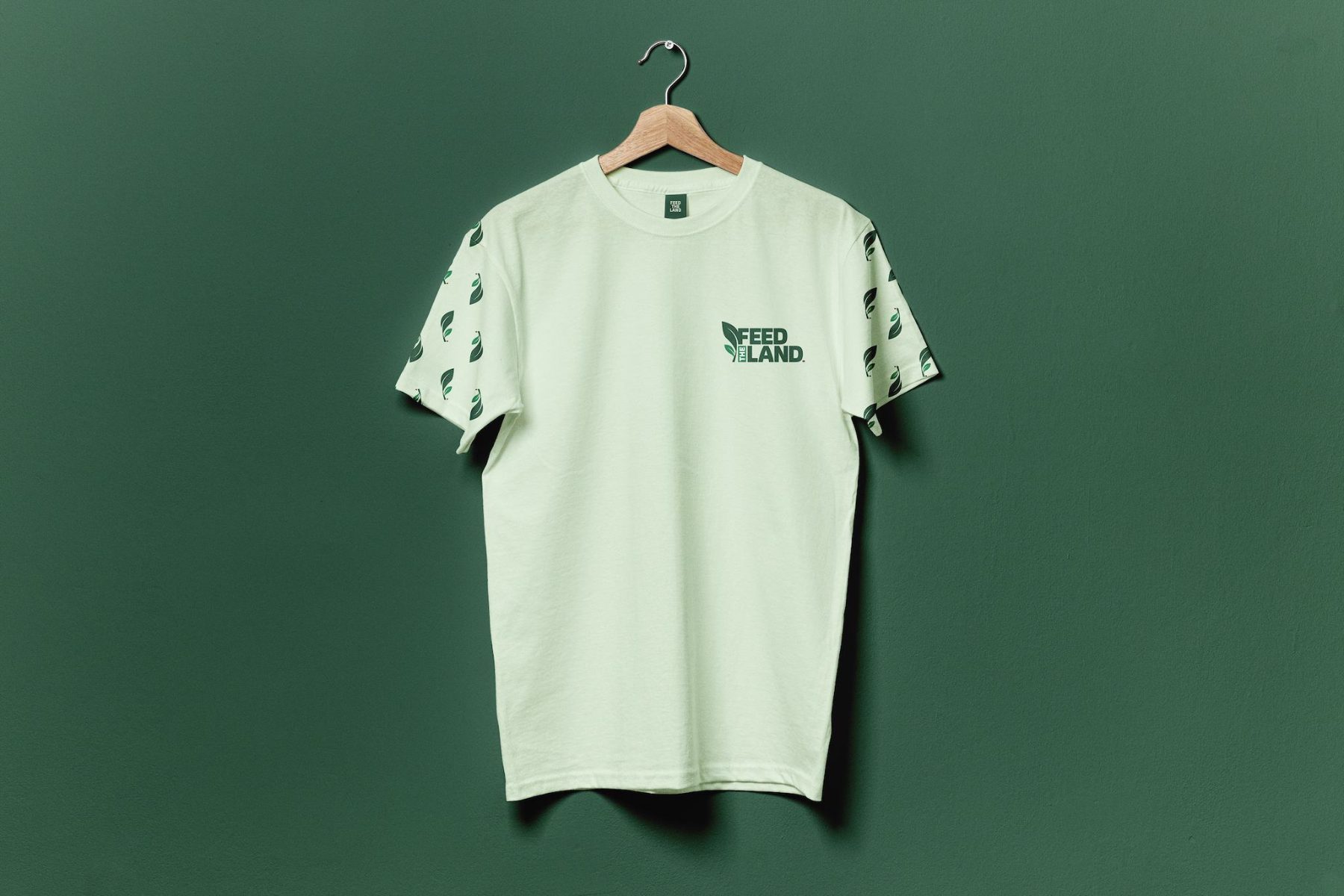 Feed The Land tee with leaf pattern sleeves