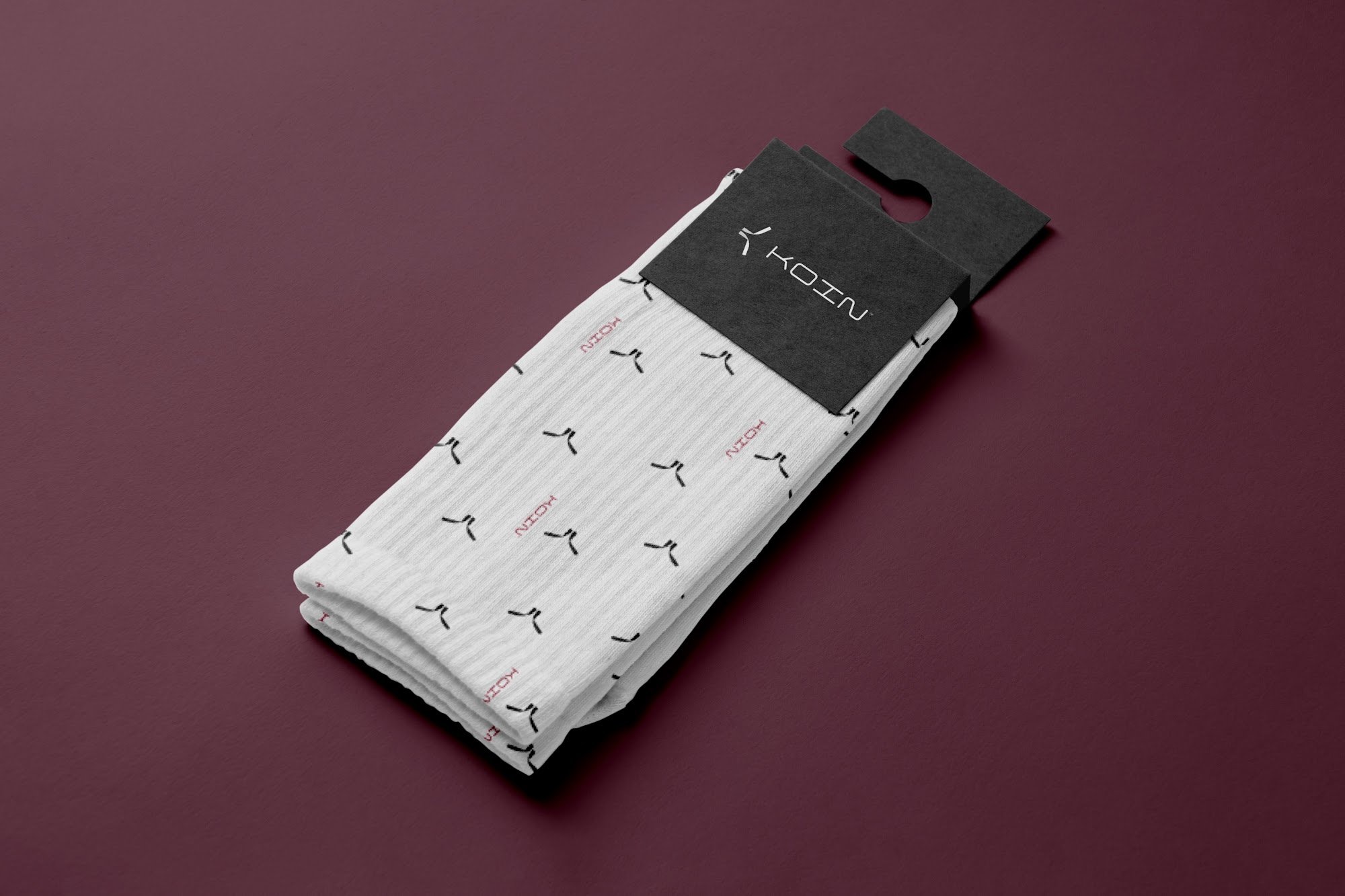 Koin socks with logomark pattern on claret