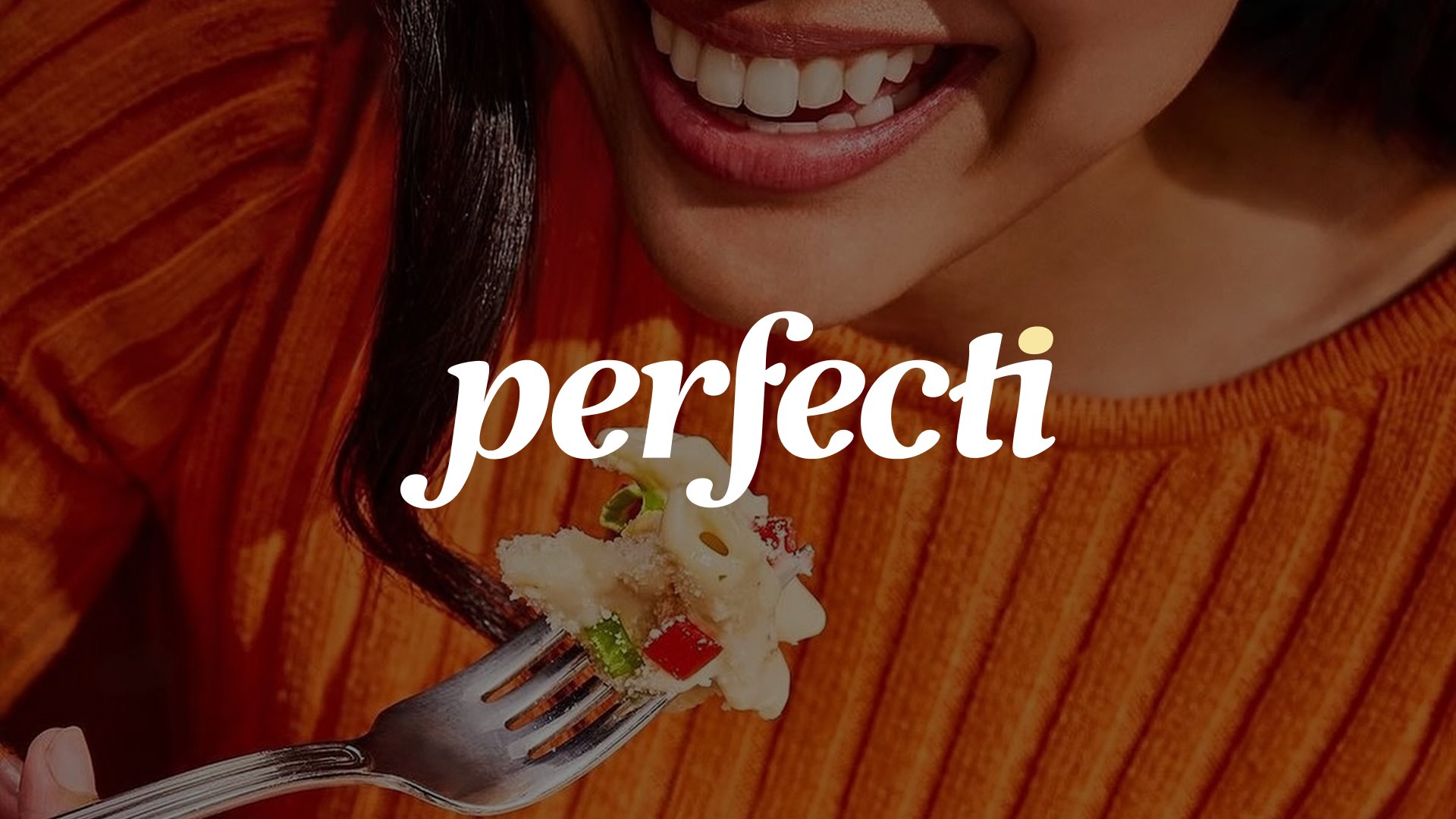 Perfecti logotype over a guest mid-bite