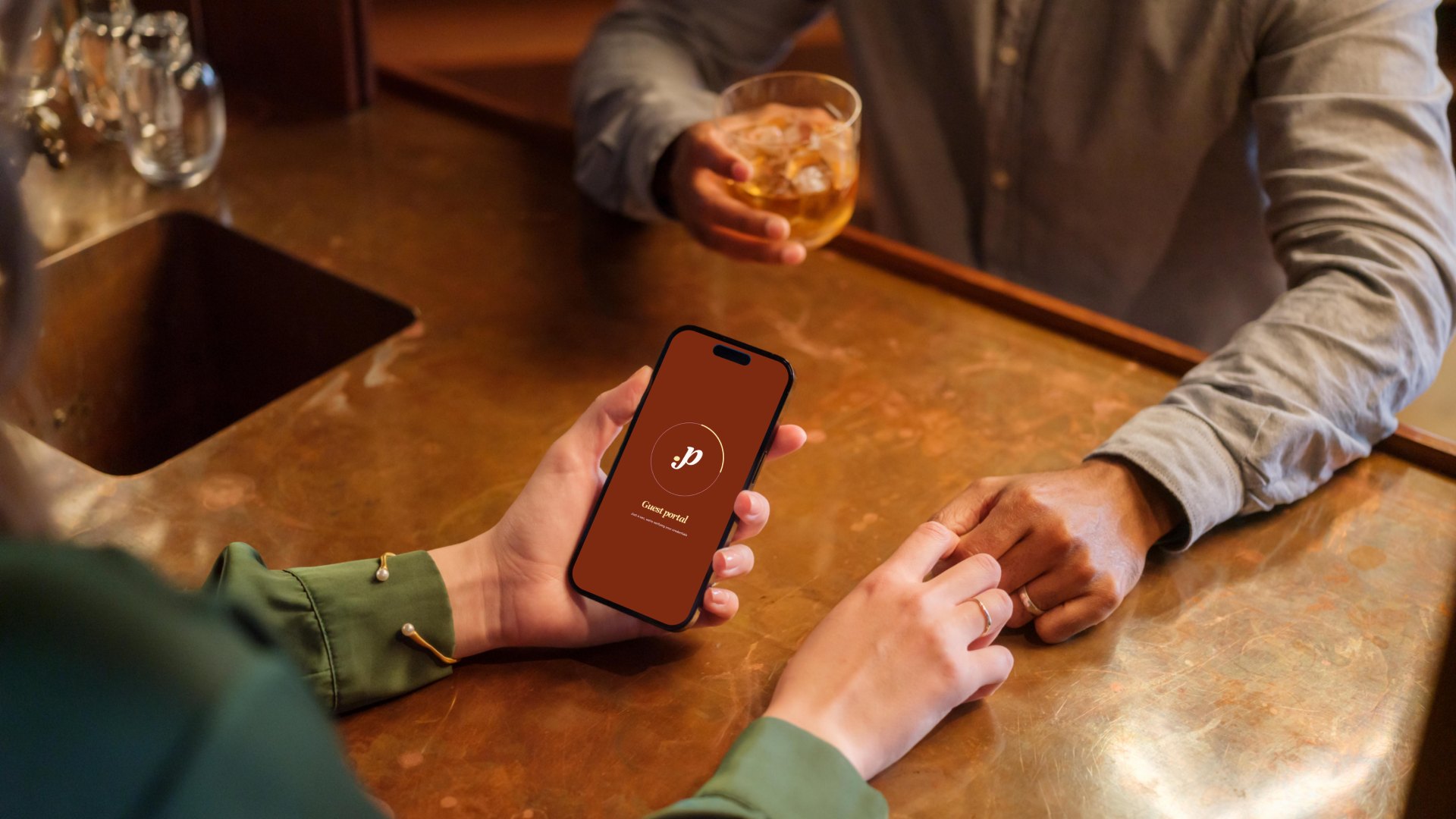 Guests holding hands at the bar, Perfecti on screen