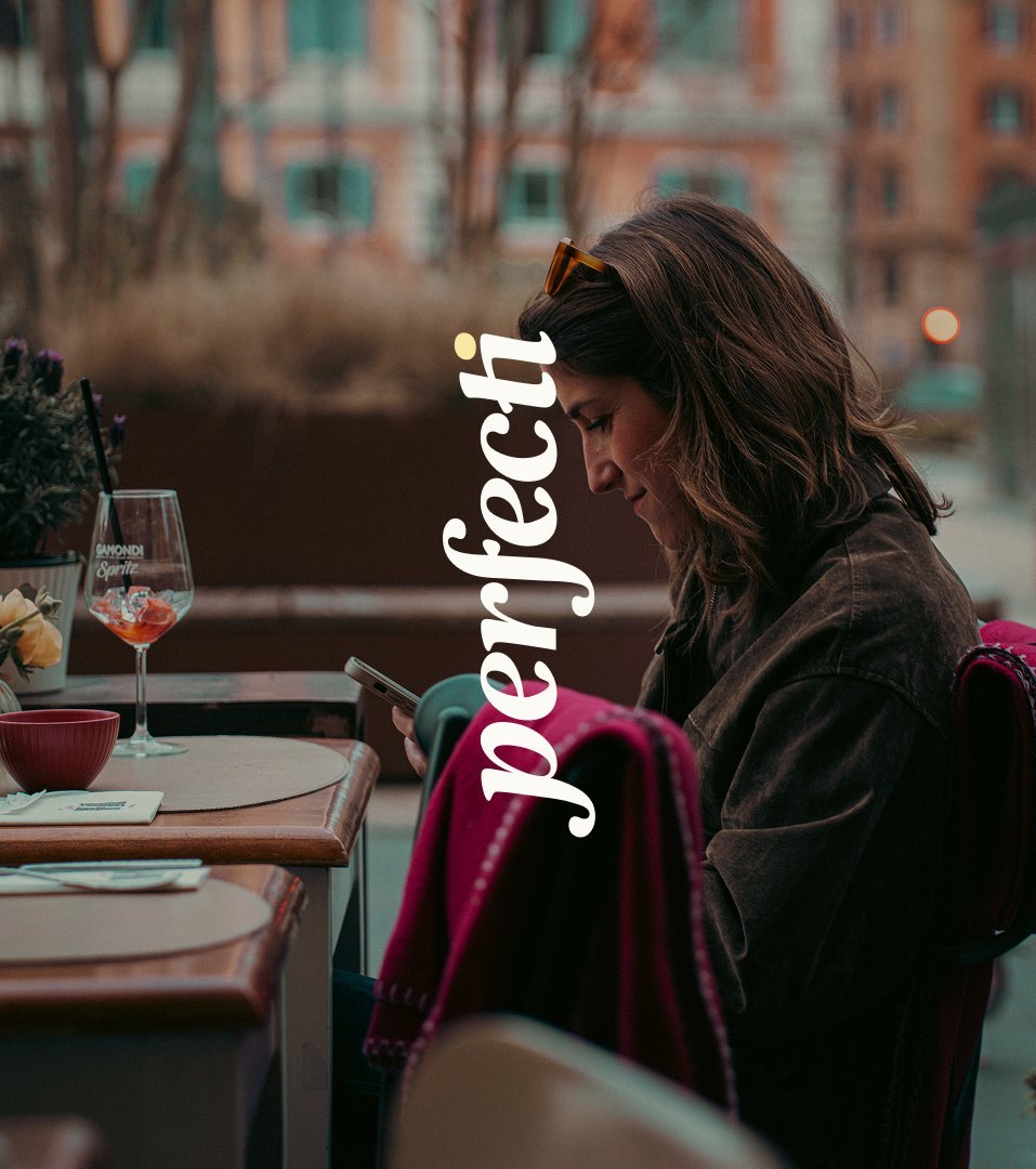 Vertical Perfecti logo running along a photo of a guest dining